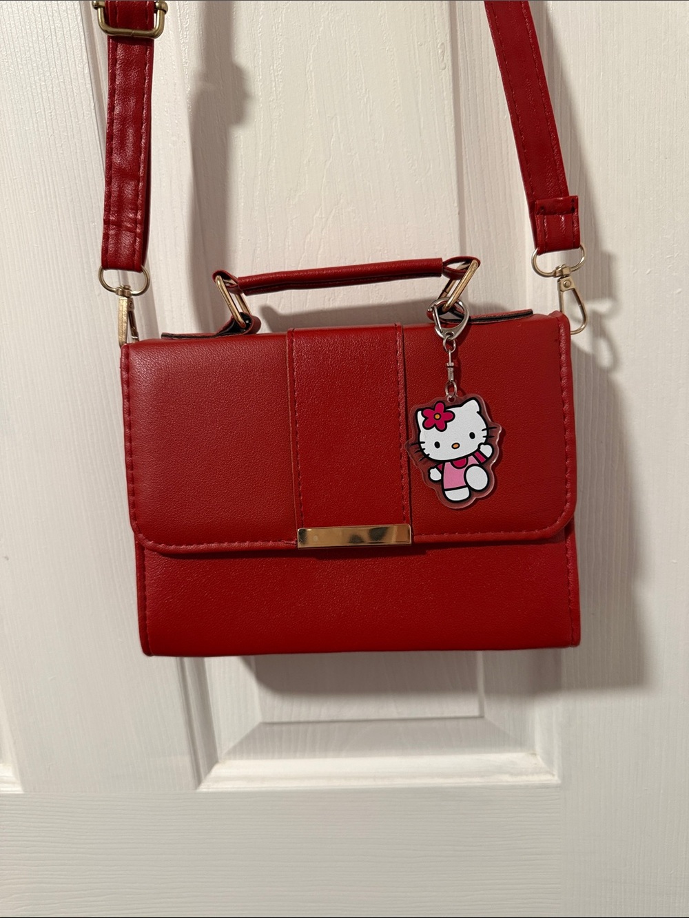 Small Red Structured Crossbody Bag with Hello Kitty Charm
